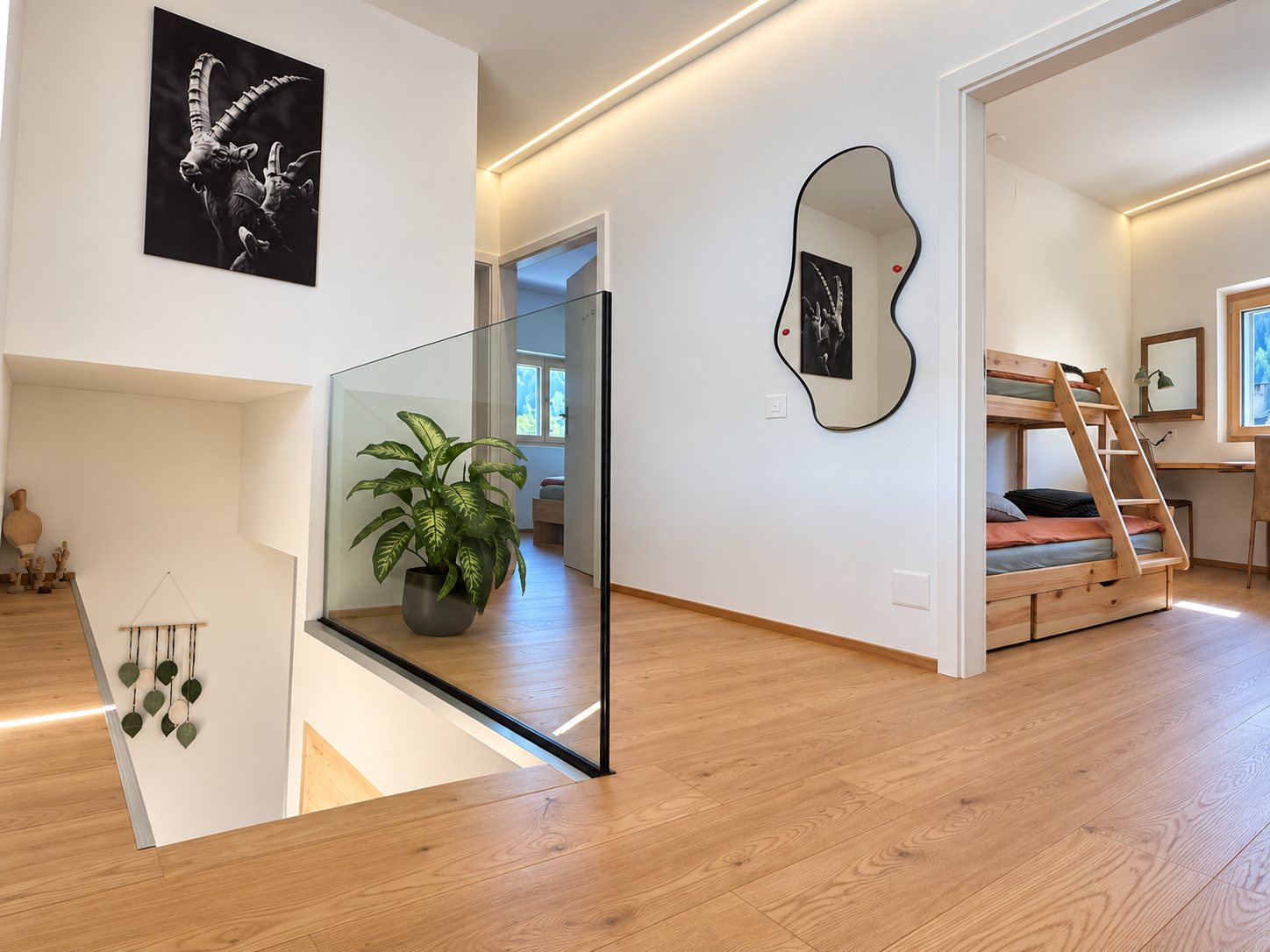 Scala in legno con parapetto in vetro e luce LED